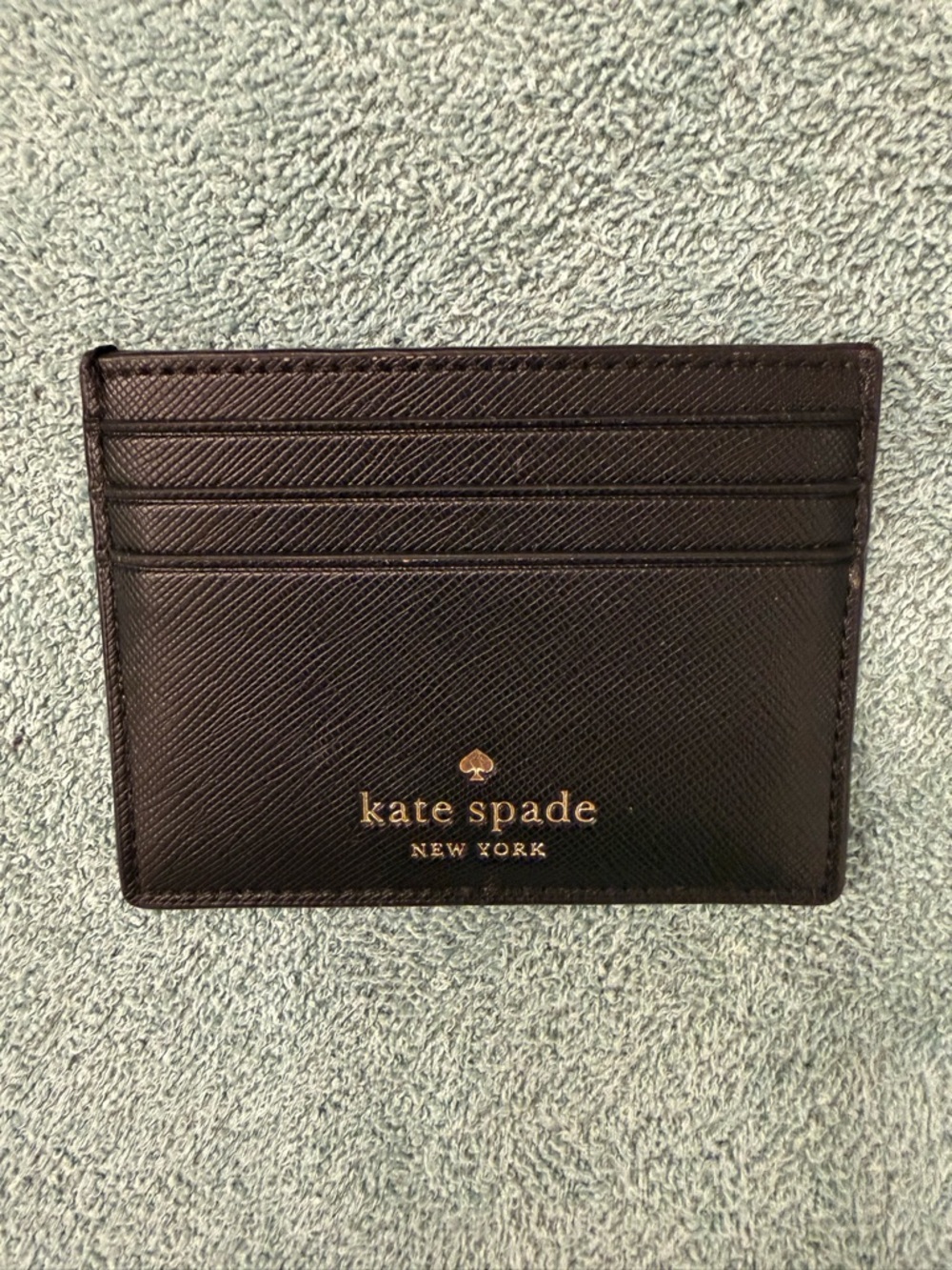 kate spade black leather card holder with gold logo